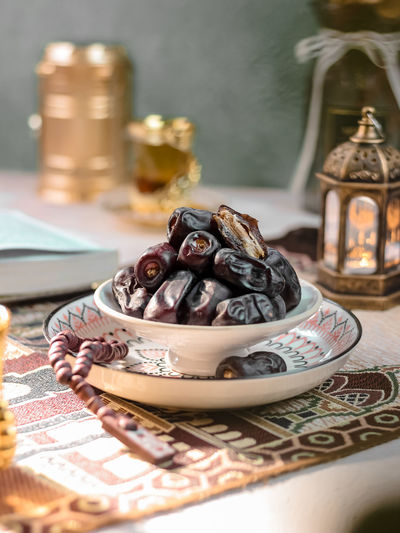 Sukari dates fruit in white bowl on the table
