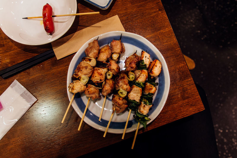 Directly above shot of yakitori in plate on table