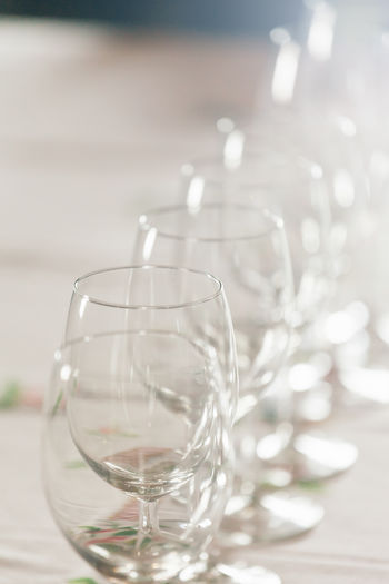 Close-up of empty wineglasses in table