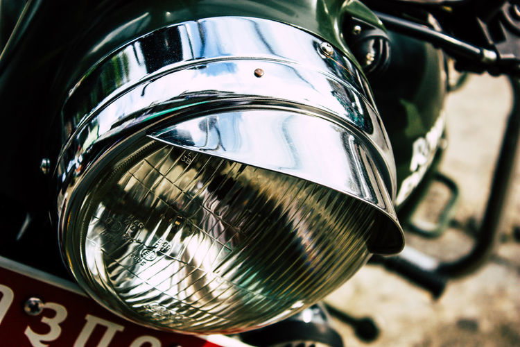 Close-up of motorcycle headlight
