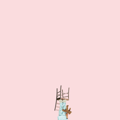 Toys against pink background