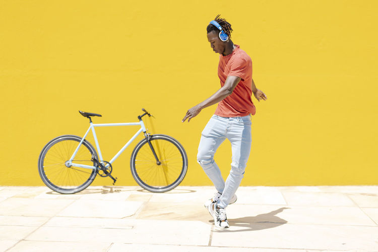 African american male dancing on street