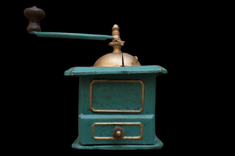 Close-up of electric lamp against black background