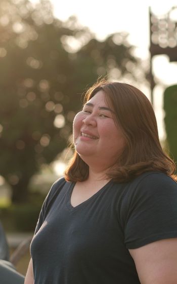 Portrait of a smiling chubby woman 