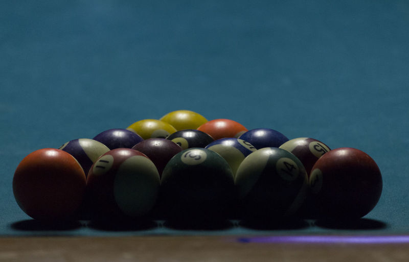 Close-up of pool balls on table