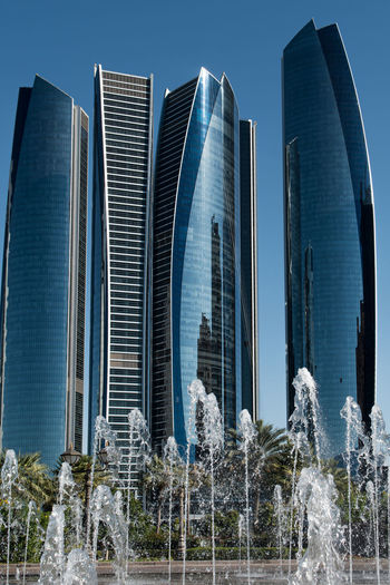 Panoramic shot of modern buildings against sky