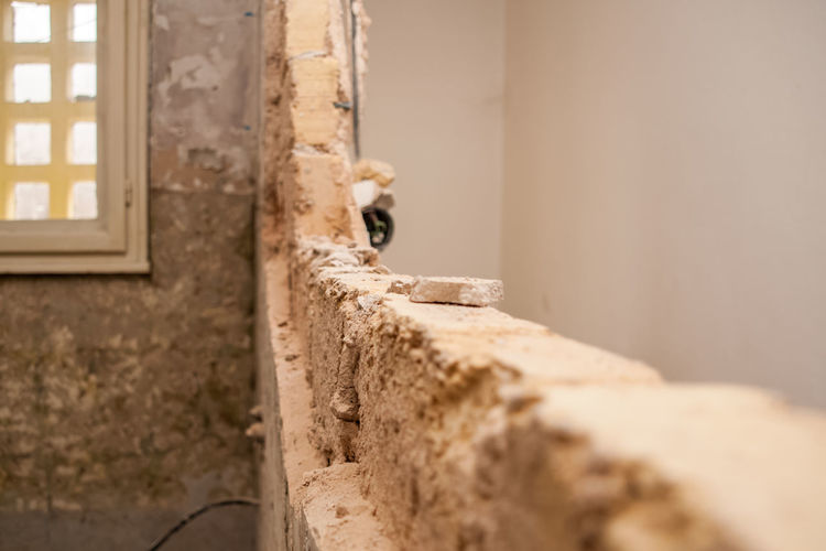 Flat renovation, demolition of the partition wall to create a single larger room
