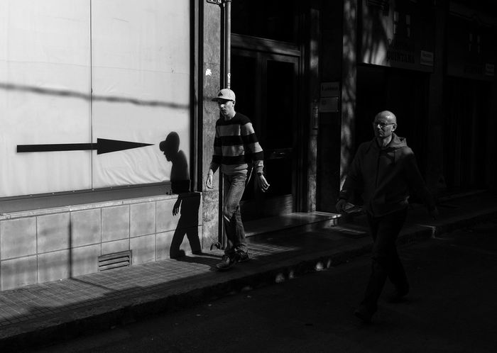 WOMAN WALKING IN CITY