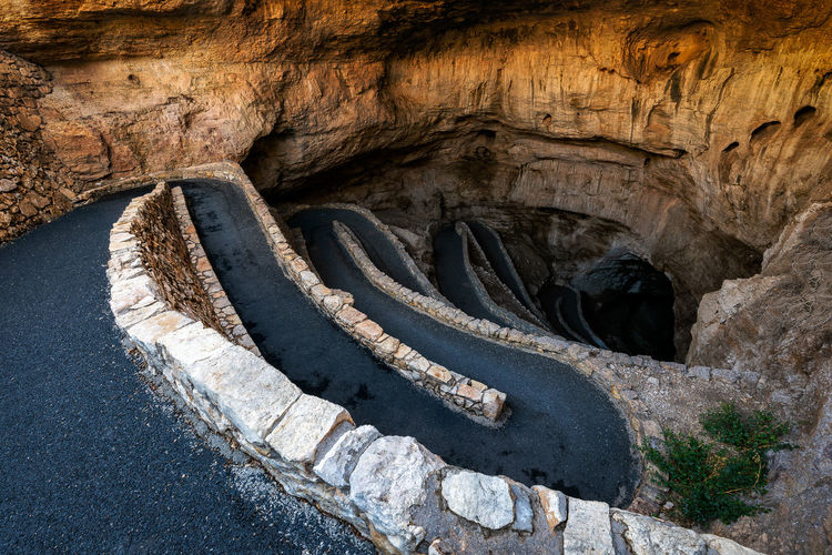High angle view of road on rock formation in cave