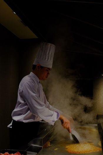 Chef preparing food in restaurant