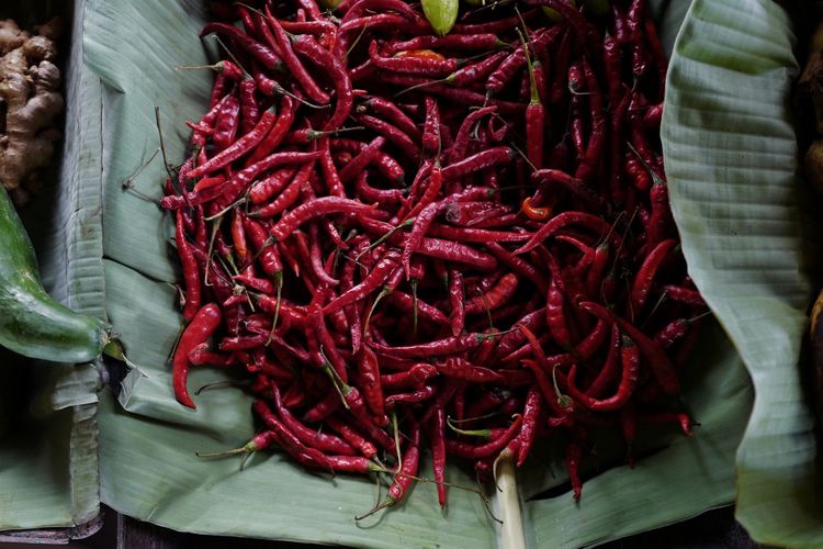 High angle view of red chili peppers for sale at market stall