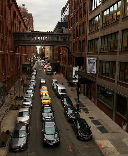 Cars parked on road in city