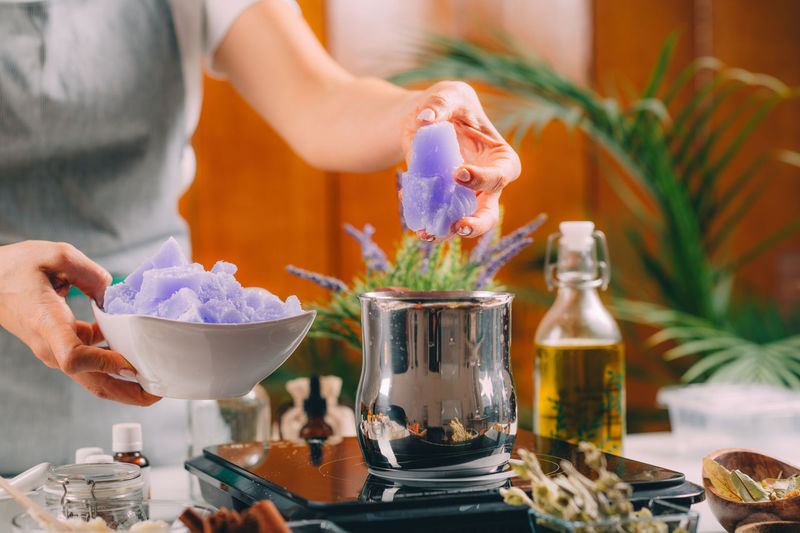 Woman preparing homemade soap