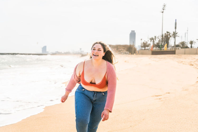 Cheerful young enjoying at beach