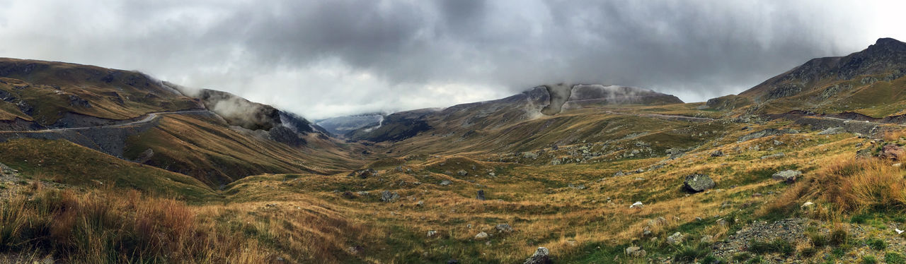 Panoramic view of mountains against sky