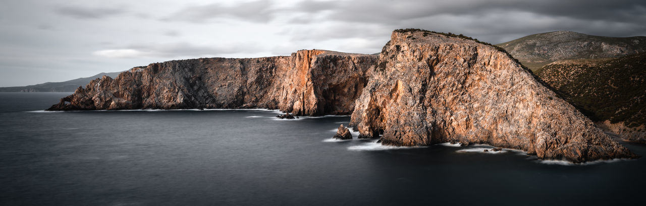 Dark look coastal stacks of cala domestica, sardinia, sulcis iglesiente