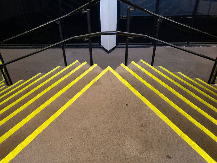High angle view of concrete stairs with yellow edges