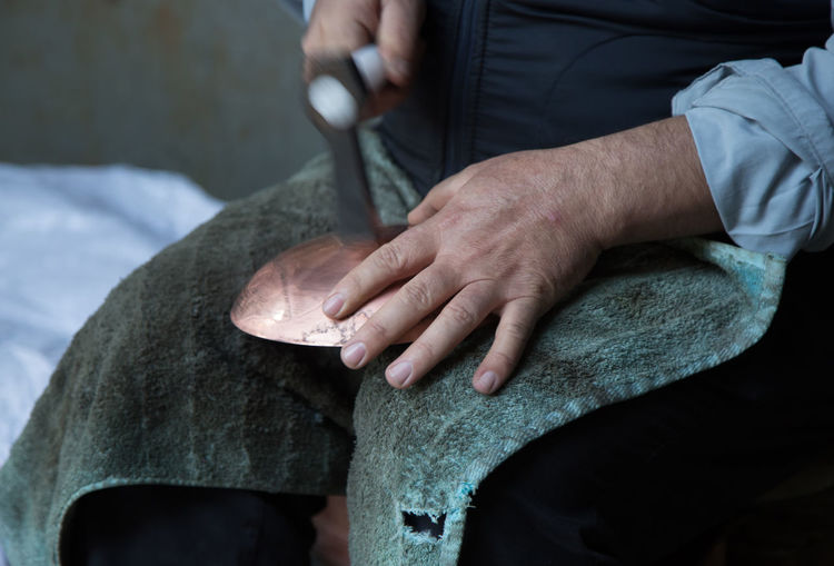 Midsection of man working