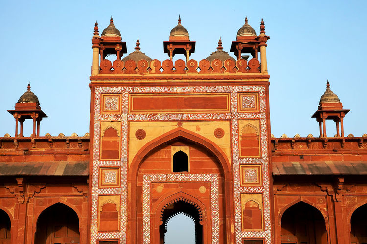 Facade of agra fort against clear sky