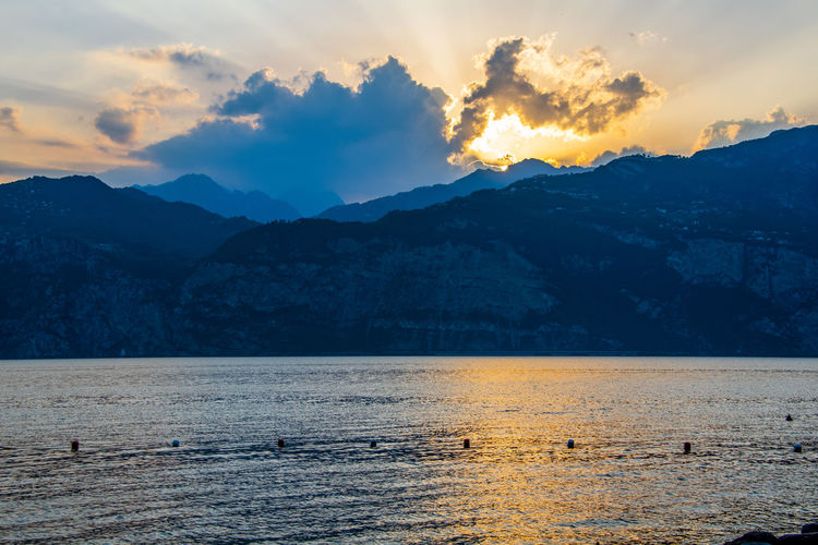 Scenic view of mountains against sky during sunset