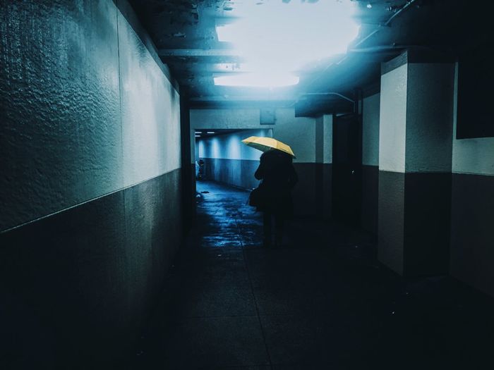 People walking in tunnel