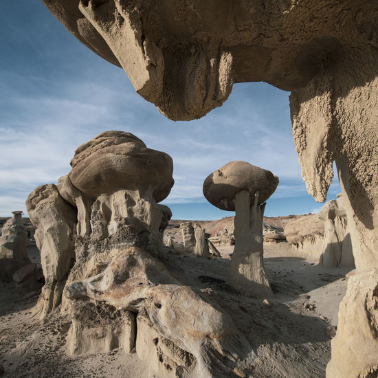 Hoodoo formations in alien landscape in new mexico desert