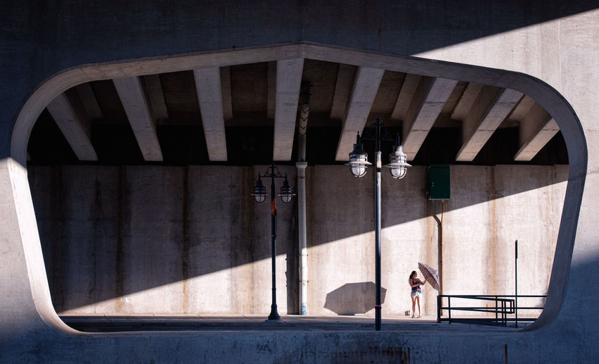 Shadow of woman on bridge