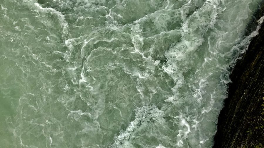 Full frame shot of rocks in sea