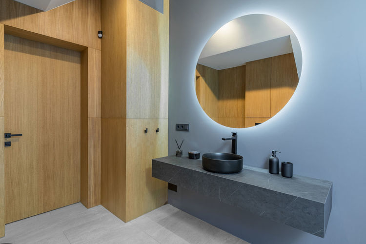 Beautiful elegant modern luxury bathroom interior in luxury home. mirror and sink