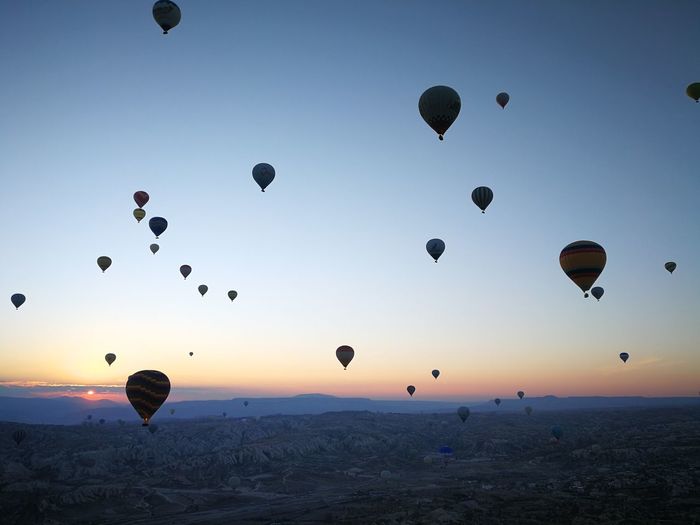 Low high angle view of hot air balloons flying in sky cappadocia kapadokya turkey colorful 