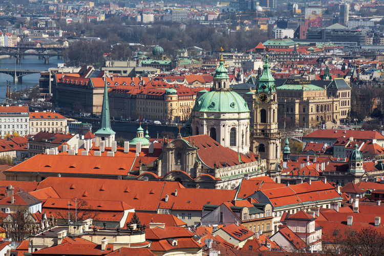 View of towers and rooftops of lesser quarter and old town of prague.