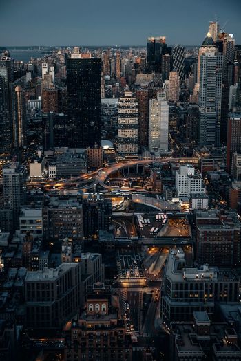 High angle view of illuminated cityscape