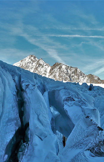 Seracs and crevasses of the riedgletcher with the majestic weisshorn in the background