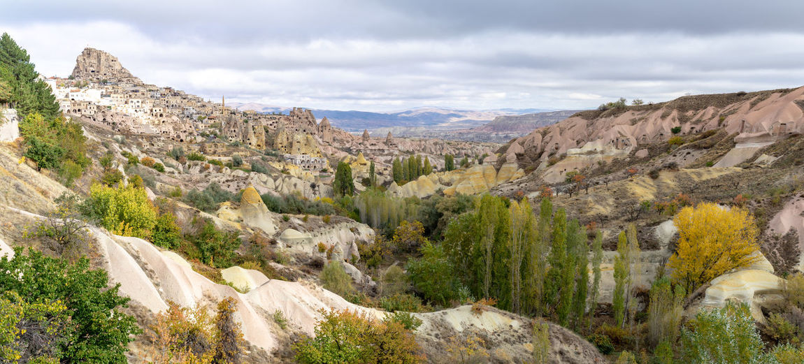 Panorama of goreme and uchisar on cloudy october day in turkey