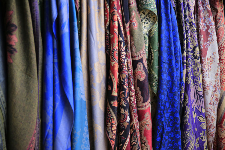 Full frame shot of clothes hanging in market