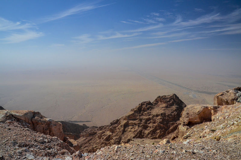 Dust and haze on the desert under the clear blue sky