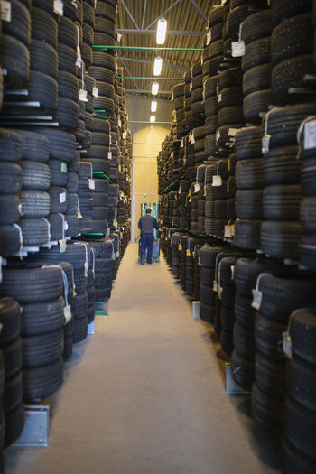 Stacks of tires in warehouse