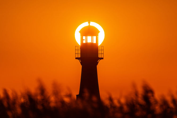 Sunrise and lighthouse