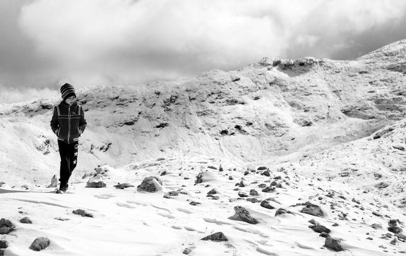 First snow on dolomites, walking on altopiano della rosetta