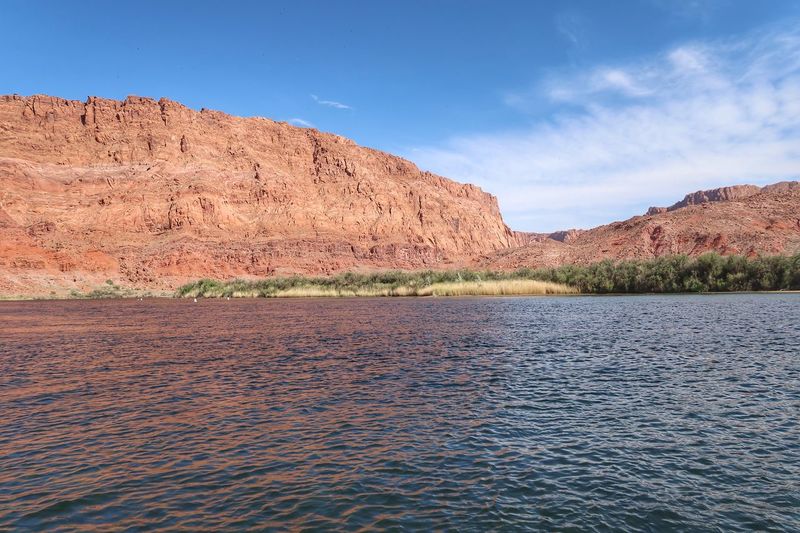Landscape of colorado river and surrounding pink mountains