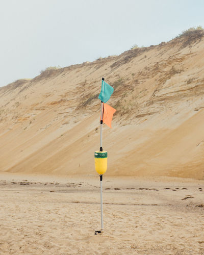 Colorful flags wave in the coastal breeze