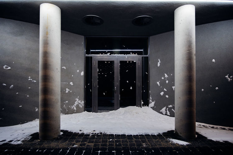Snow covered entrance of building