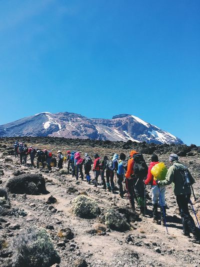 People climbing mt kilimanjaro