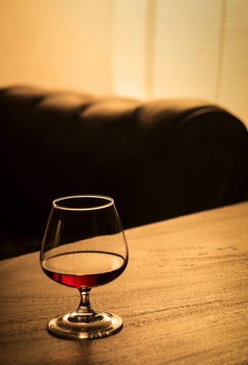 Close-up of wine glass on table
