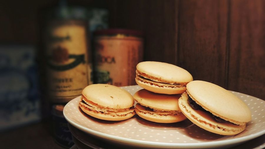 Close-up of macaroons in plate on table