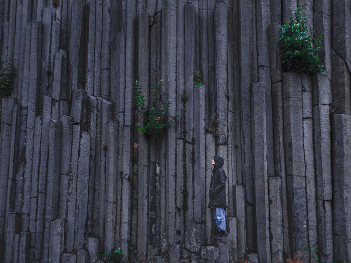 Full frame shot of woman standing against rocks