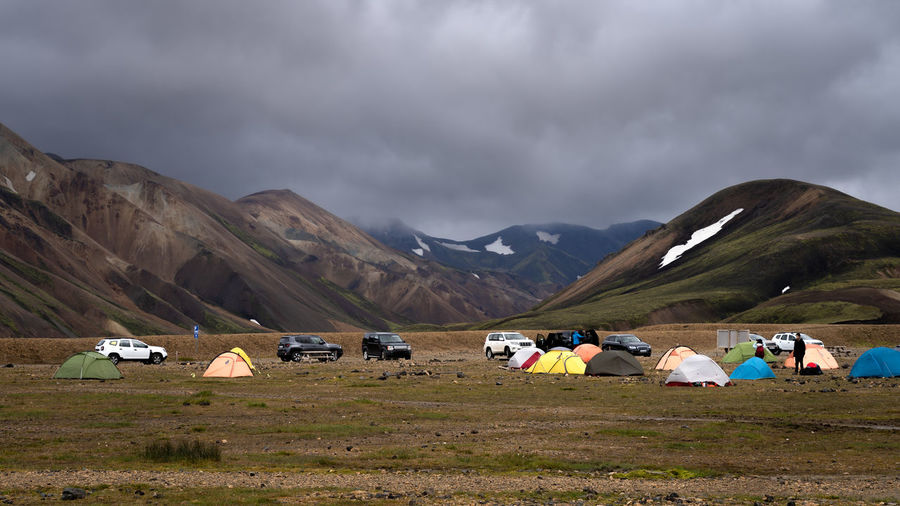Landmannalaugar camping site surrounded by magnificent colourful mountains, highlands of iceland 