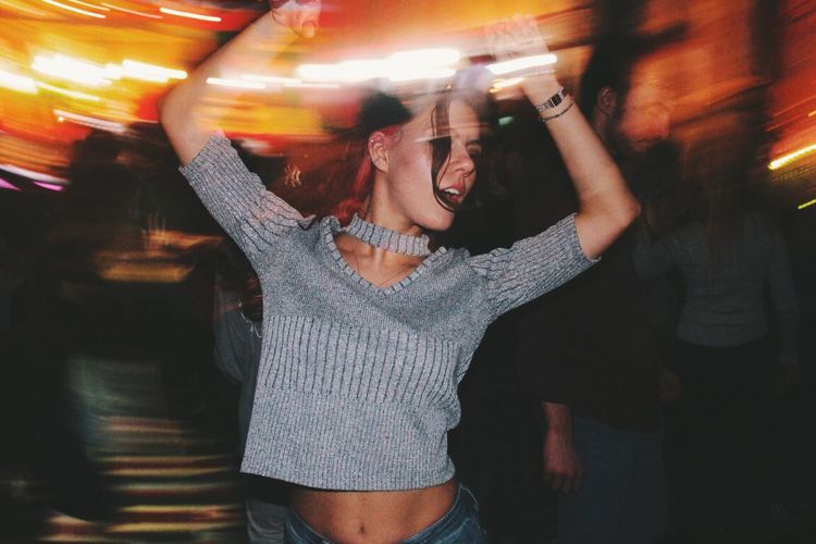 View of woman dancing in club