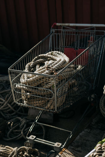 Old rope in shopping bucket