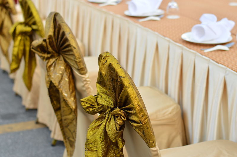 Close-up of arranged dining table at wedding ceremony